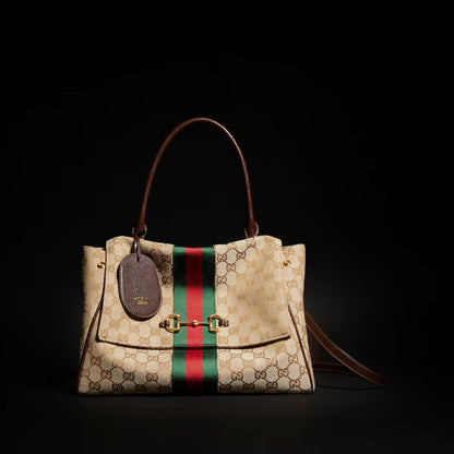 GUCCI Paparazzo medium top handle bag